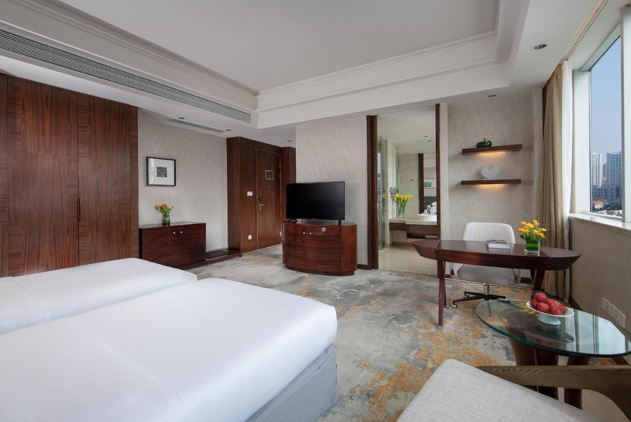 Golden Shining New Century Grand Hotel Beihai Exterior foto