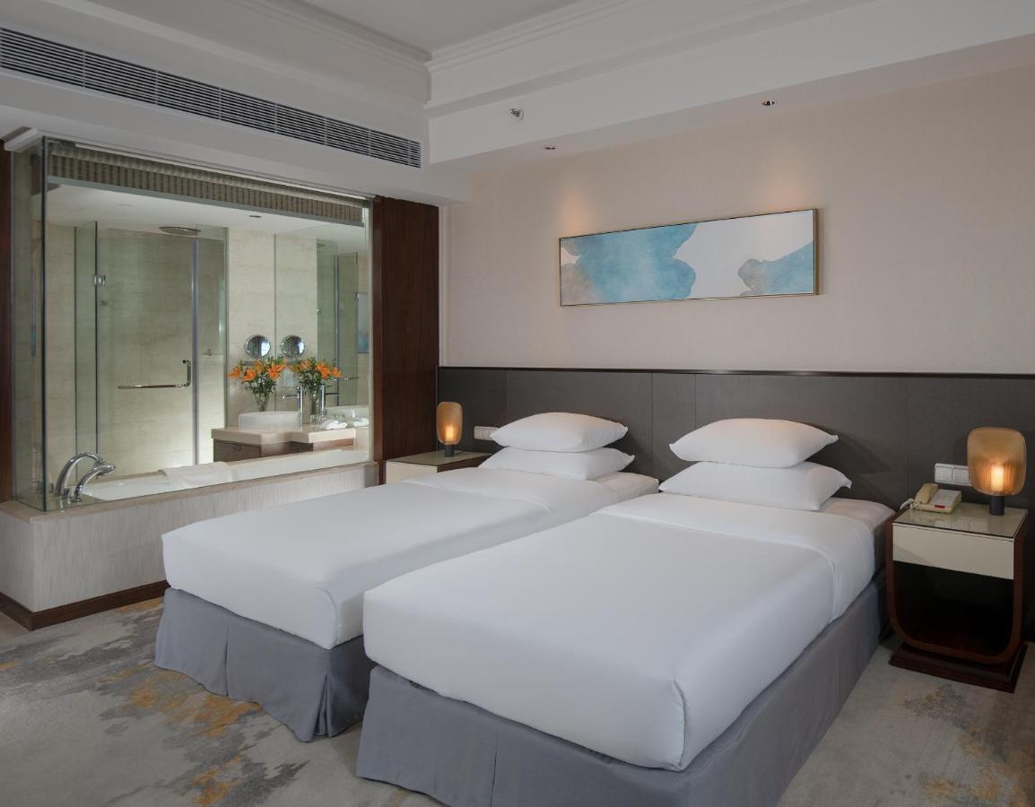 Golden Shining New Century Grand Hotel Beihai Exterior foto
