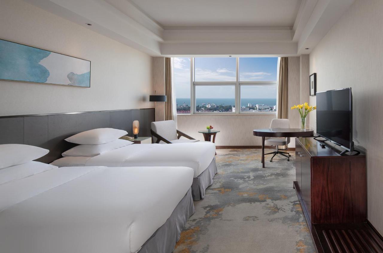 Golden Shining New Century Grand Hotel Beihai Exterior foto